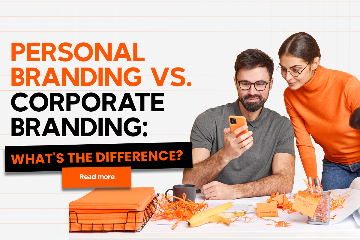 Two people look at a phone together while working at a table full of office supplies. The text on the image reads "Personal Branding vs. Corporate Branding: What's the Difference?" with a "Read more" button below. The background features a grid pattern.